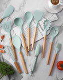 Ensemble d'ustensiles de cuisine en silicone 12 pièces avec poignées en bois – Ustensiles de cuisine résistants à la chaleur et antiadhésifs comprenant des pinces, une spatule, une cuillère et un support – Passe au lave-vaisselle