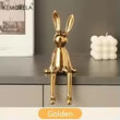 1 pièce en céramique lapin assis à longues oreilles ornements de chambre statue de luxe décoration de la maison accessoires haut de gamme art de la maison esthétique